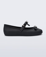 Side view of a black Soft Ballerina Bow with bows and a pearl in the center of each bow
