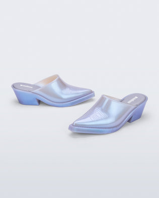 Side and angled view of a pair of pearly blue Texas Mule heels