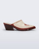 Side view of a beige with red accents and heel Texas Mule heel