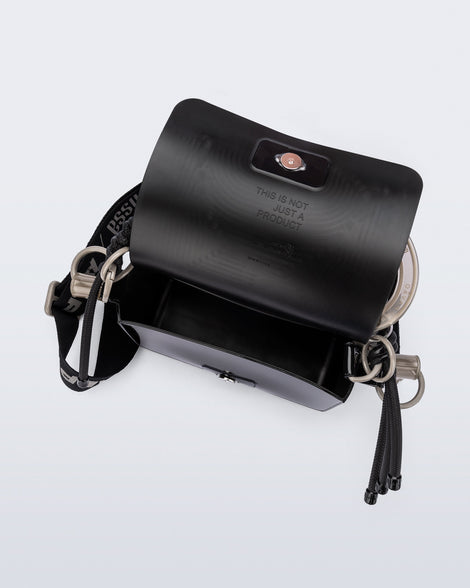 Top view of an black Olga Bag + Alexandre Pavao with short strap fabric long  strap