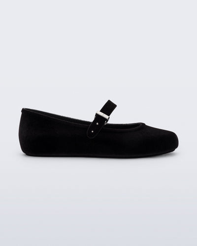 Side view of a black Soft Ballerina Velvet II flat