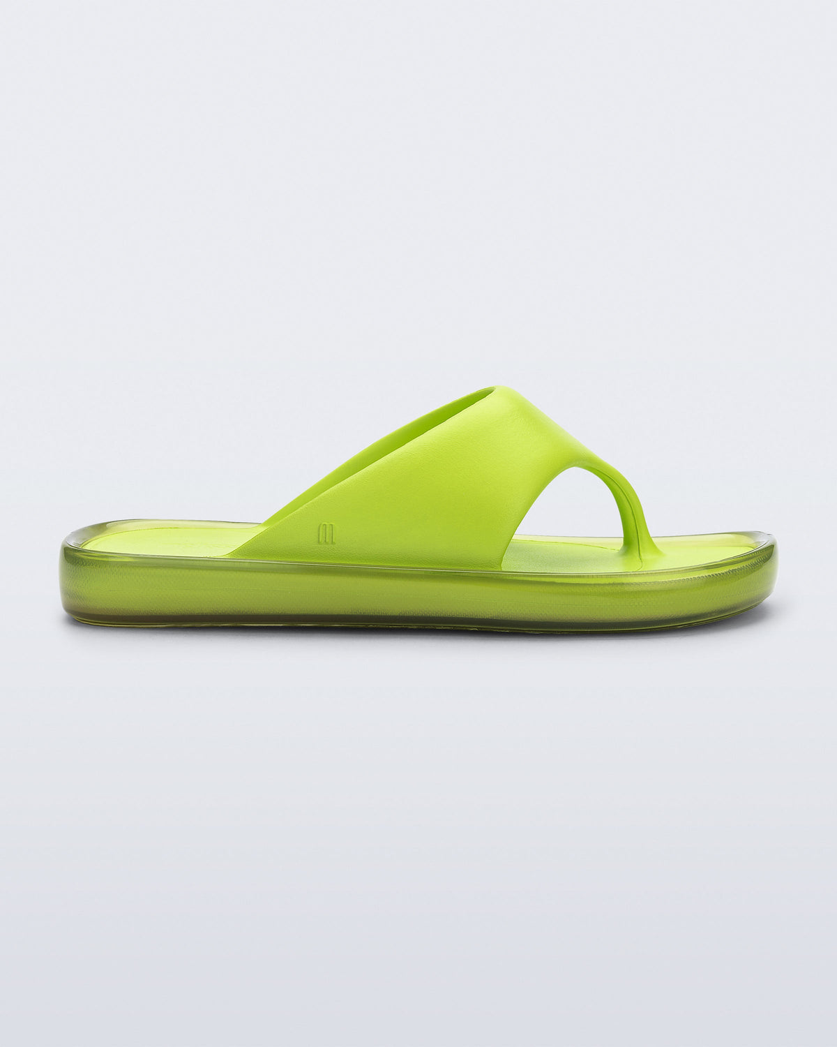 Side view of a green Float flip flop