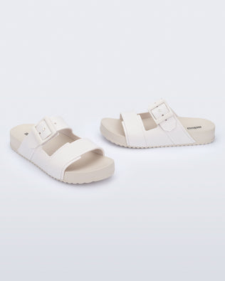 Product element, title Cozy Connection Slide in Beige/White
 price €56,00