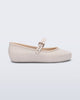 Side view of a beige Soft Ballerina kids flat with strap