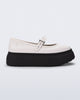 Side view of a white Soft Ballerina Platform flats with black sole