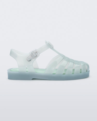 Side view of a light green kids Possession sandal