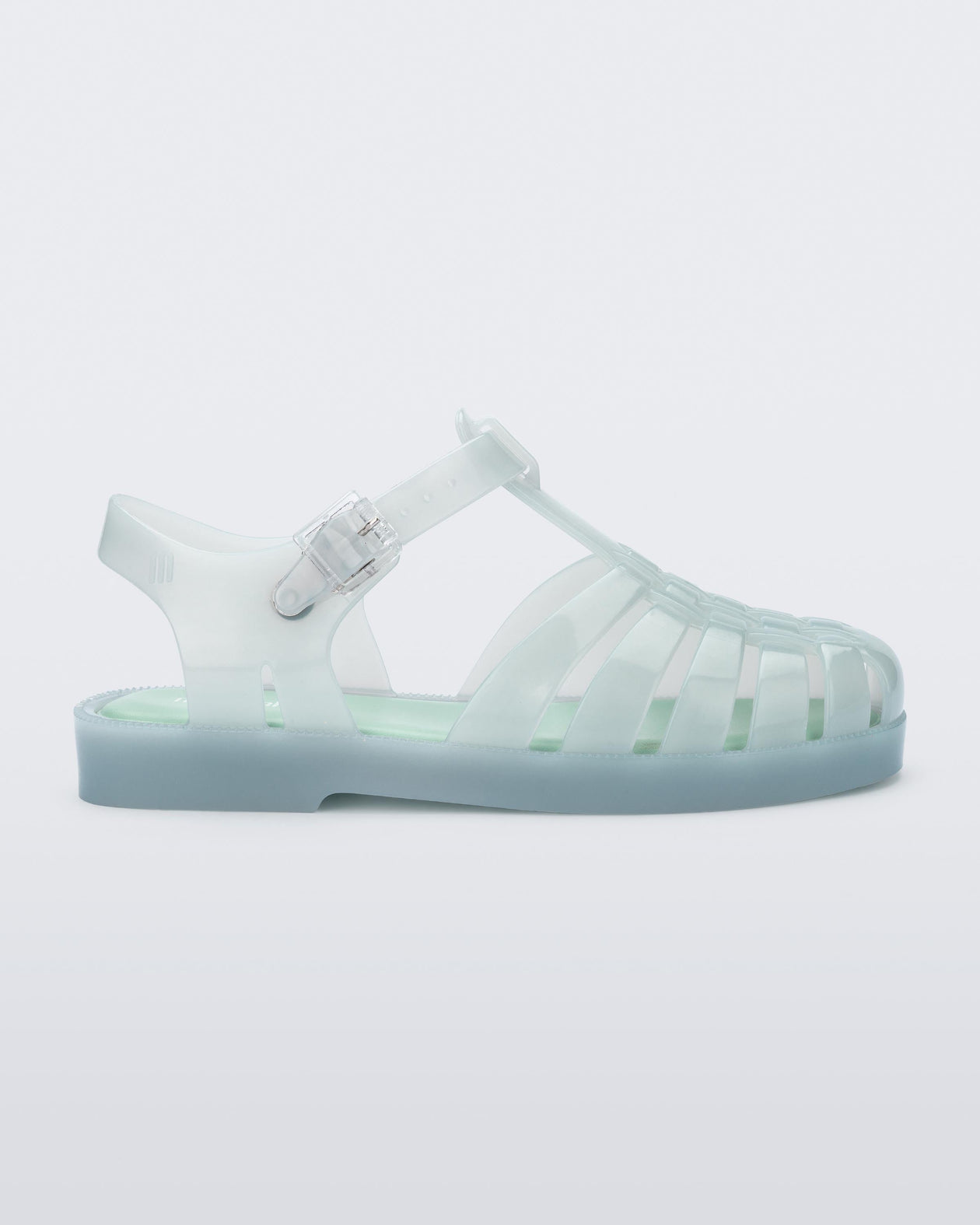 Side view of a light green kids Possession sandal