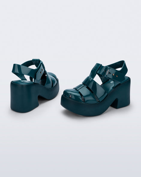 Back and side view of a pair of blue Lulu platform heel fisherman sandals