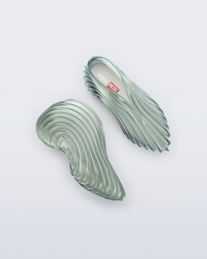 Top and side view of a transparent green Sneaker + Diesel
