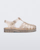 Side view of a glitter beige kids Possession sandal