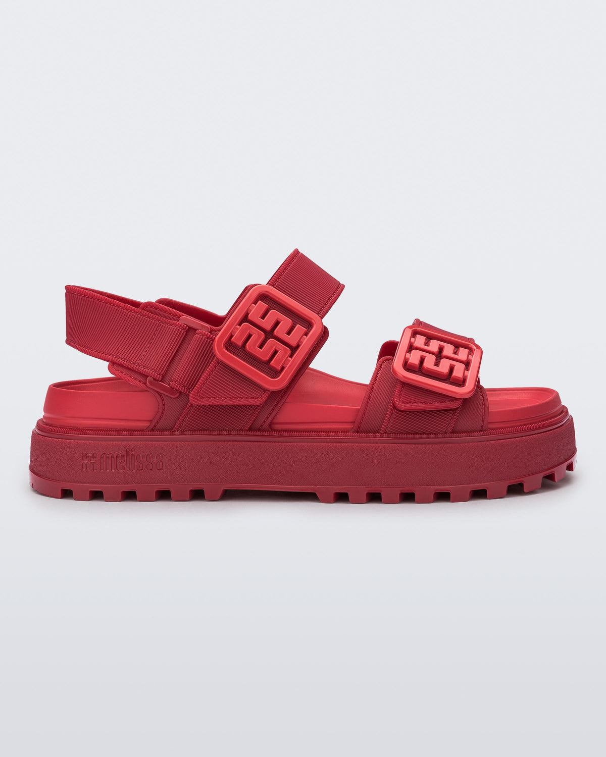 Side view of a red Towny sandal with straps