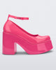 Side view of a pink Doll Heel women's platform shoe.