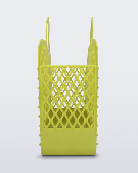 Side view of the glitter green Bag + Bimba y Lola