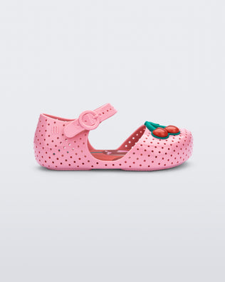 Side view of a pink Pop baby flat with 2 red cherries