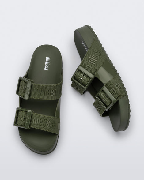 Top and side view of a pair of green Cozy M Love adult slides