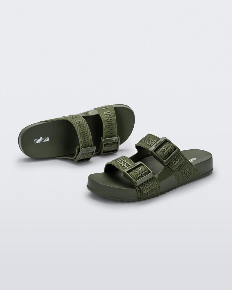 Top and angled view of a pair of green Cozy M Love adult slides