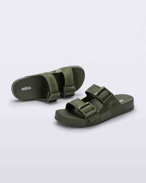 Top and angled view of a pair of green Cozy M Love adult slides