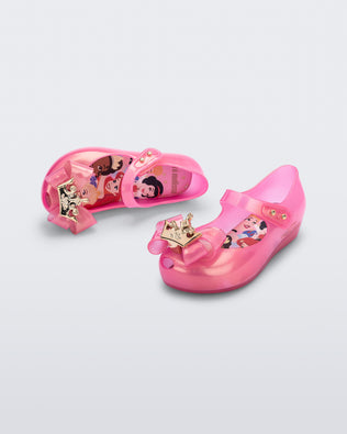Angled and top view of a pair of pearly pink baby Ultragirl Princess flats