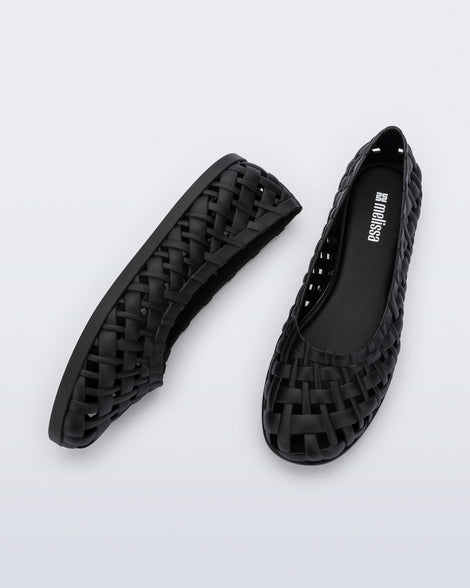 Top and side view of a pair of black Possession Ballerina flats