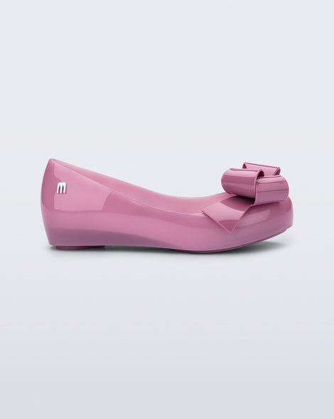 Side view of a lilac Ultragirl Classy baby ballerina with lilac bow.