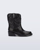 Side view of a glitter black Texas kids boot