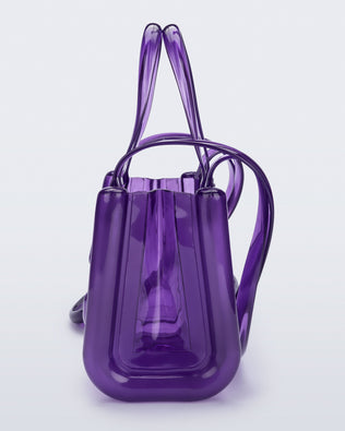 Side view of the purple Small Jelly Shopper x Telfar bag