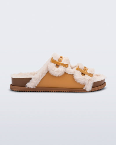 Side view of an orange Cozy Warm Slide with beige fuzzy insole