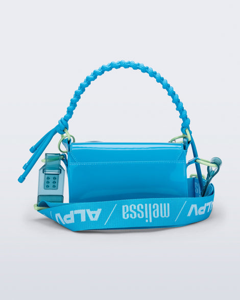 Back view of an blue Olga Bag + Alexandre Pavao with short strap fabric long  strap