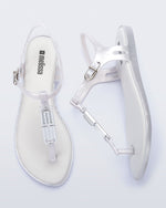 Side and top view of a pair of pearly white Solar M Chic sandals