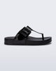 Side view of a black Cozy Flip flop