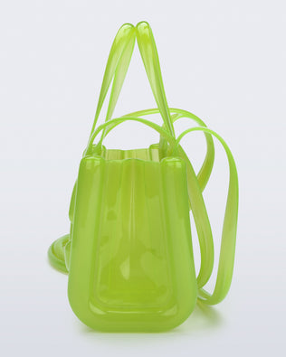 Side view of the green Small Jelly Shopper x Telfar bag
