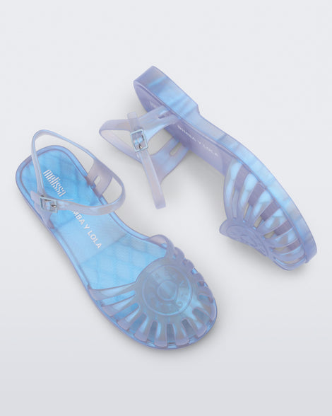 Top and side view of a pair of the pearly blue Sandal + Bimba y Lola with ankle strap