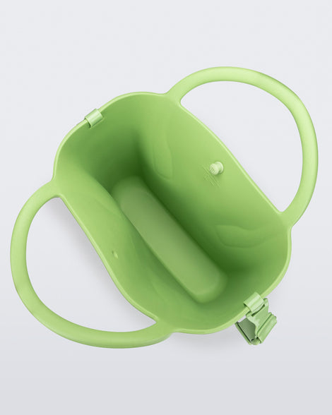 Top view of a green Free Big Bag with handles and a strap