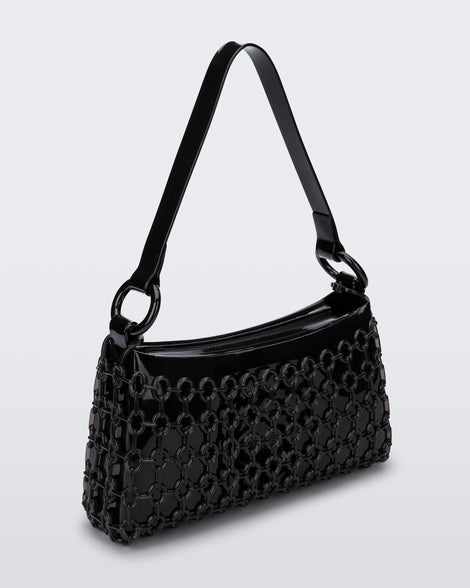 Angled view of a black Hoop bag with short shoulder strap