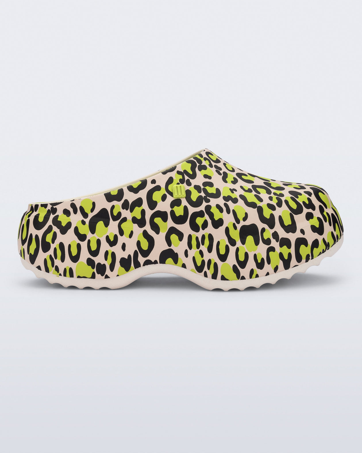Side view of a beige/green leopard print Free Clog Print Platform.