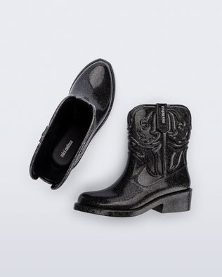 Top and side view of a pair of glitter black Texas kids boots