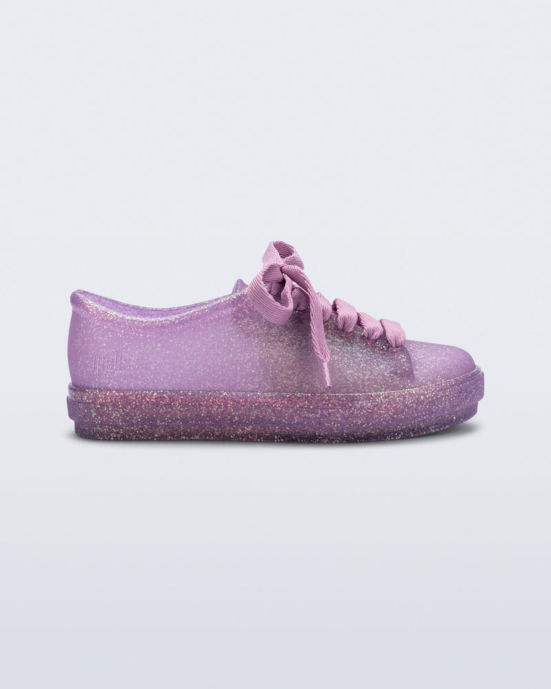 Side view of a glitter lilac kids Hip Sneaker with lilac laces