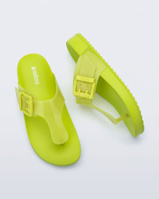 Top and side view of a pair of green Cozy Flip flops