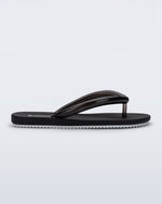 Side view of a black Flip Flop Airflow sandal with white bottom