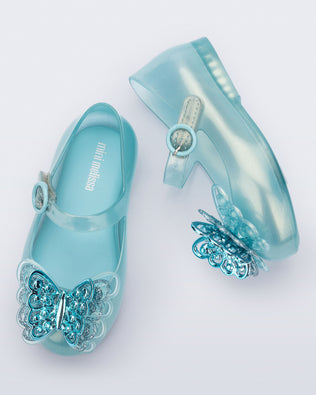 Top and side view of a pair of blue Sweet Love Butterfly baby flats