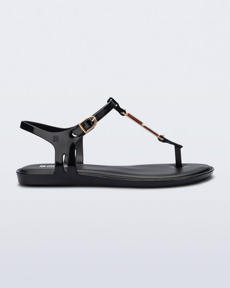 Side view of a black Solar M Chic sandal