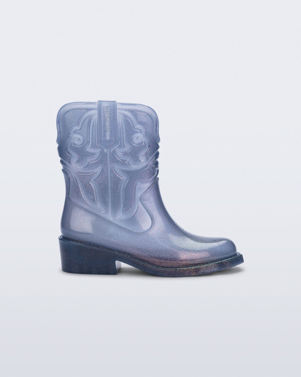 Side view of a glitter blue Texas kids boot