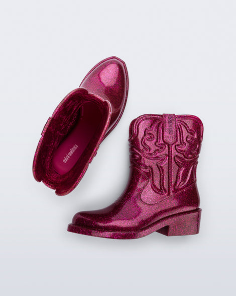 Top and side view of a pair of glitter pink Texas kids boots