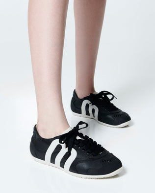 Product element, title Motion in Beige/Black
 price €89,00