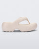 Side view of a beige Free Platform II flip flop