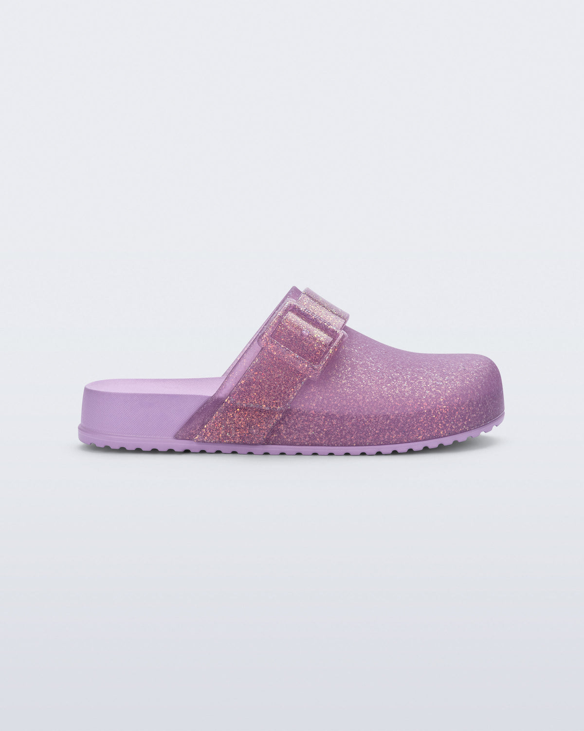 Side view of a glitter lilac Cozy Clog for kids