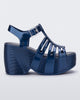Side view of a blue Station 79 platform heel with ankle strap