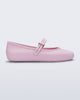 Side view of a pink Soft Ballerina flat with top buckle strap