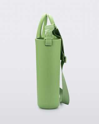 Side view of a green Free Big Bag with handles and a strap