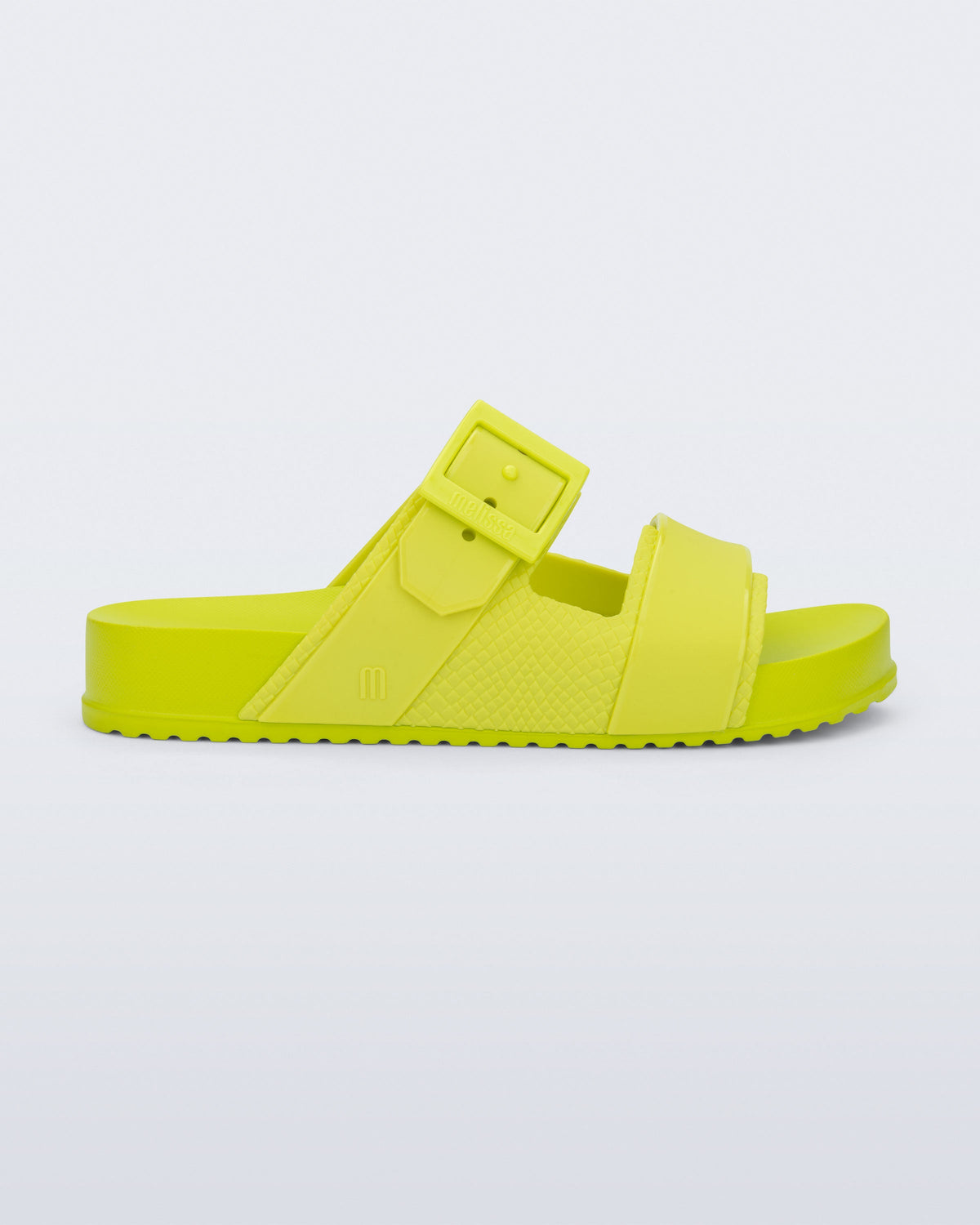Side view of a green Cozy Connection slide
